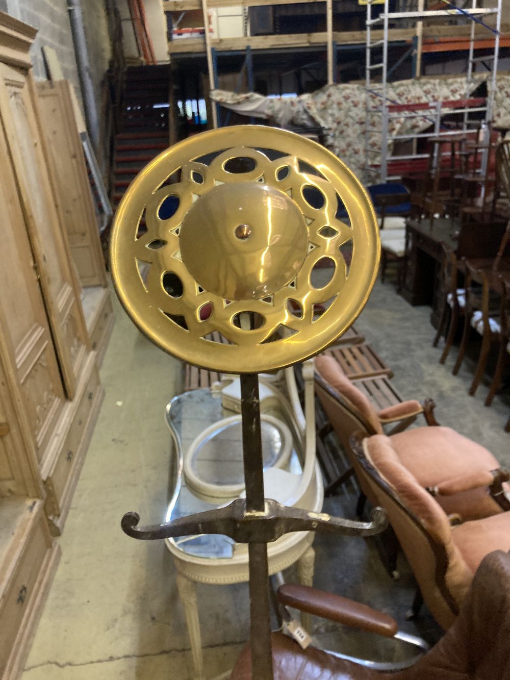 A Victorian copper and brass circular coal bucket, diameter 34cm, together with a pair of brass and wrought iron andirons